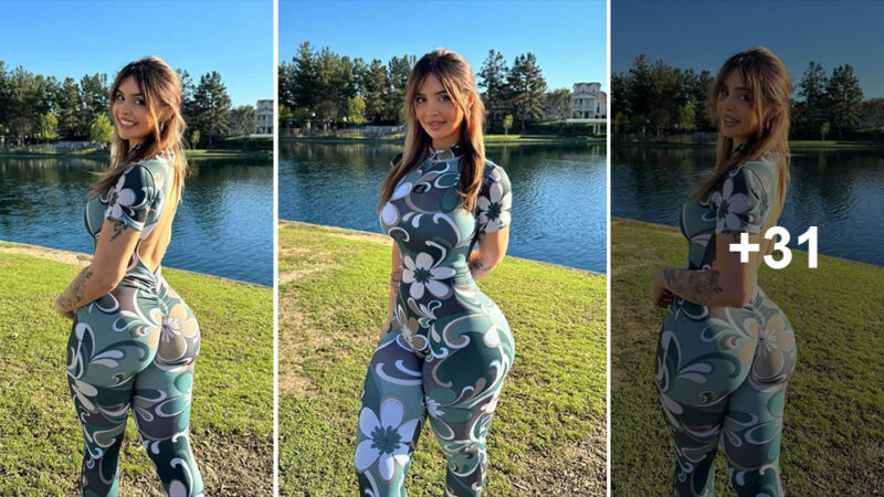 Evana Maria showscase her perfect body in a tight outfit by the lake